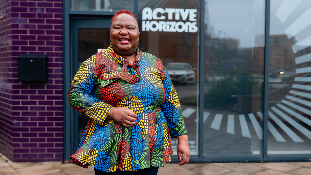 Yeukai Taruvinga, founder of Active Horizons, standing outside the Active Horizons community hub